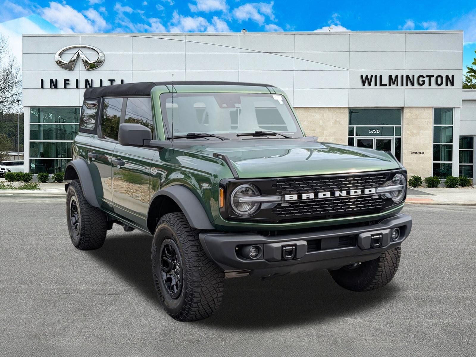 2023 Ford Bronco Wildtrak in Eruption Green Metallic — front three-quarter view