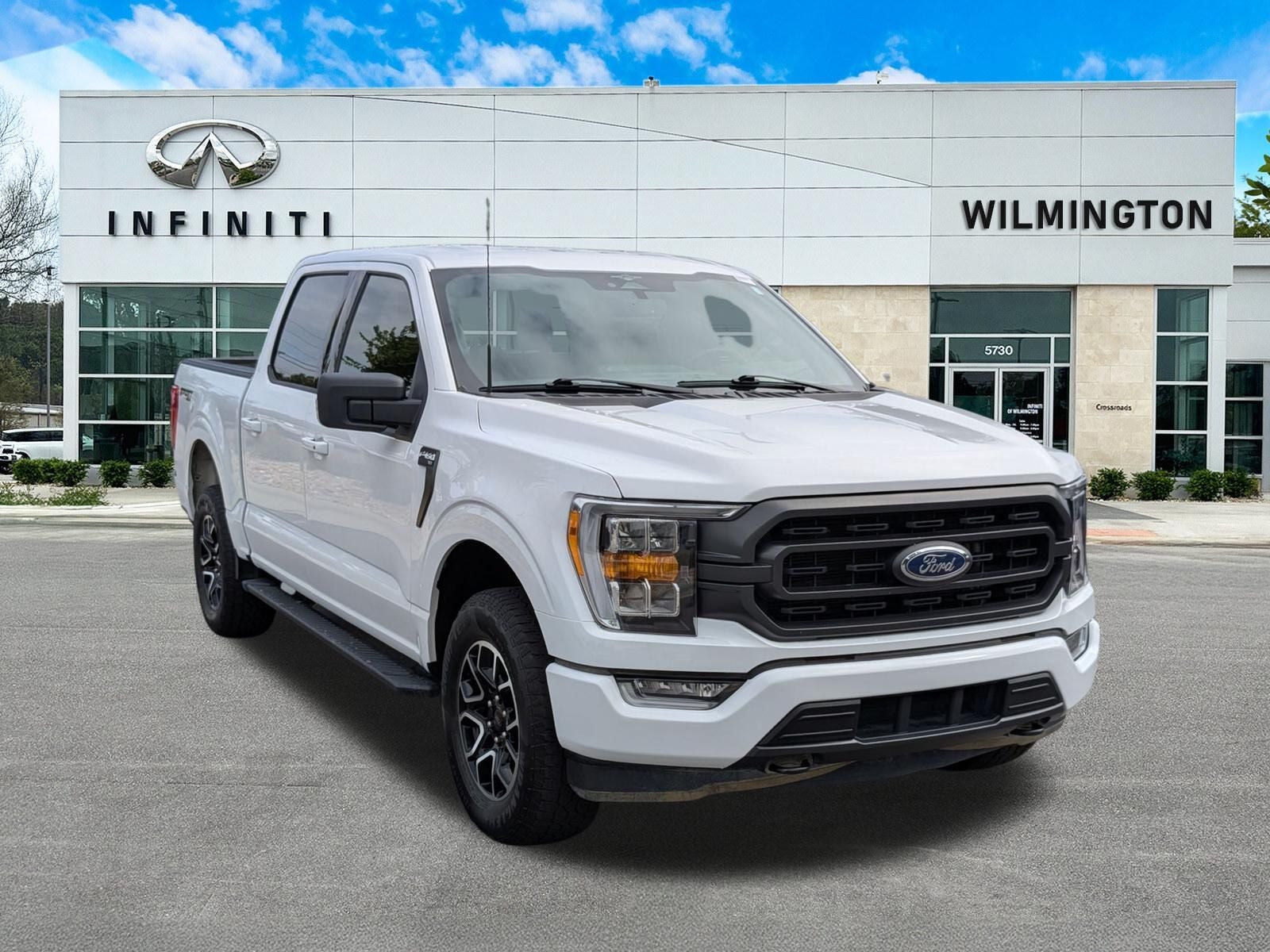 2023 Ford F-150 XLT in Oxford White — front three-quarter view