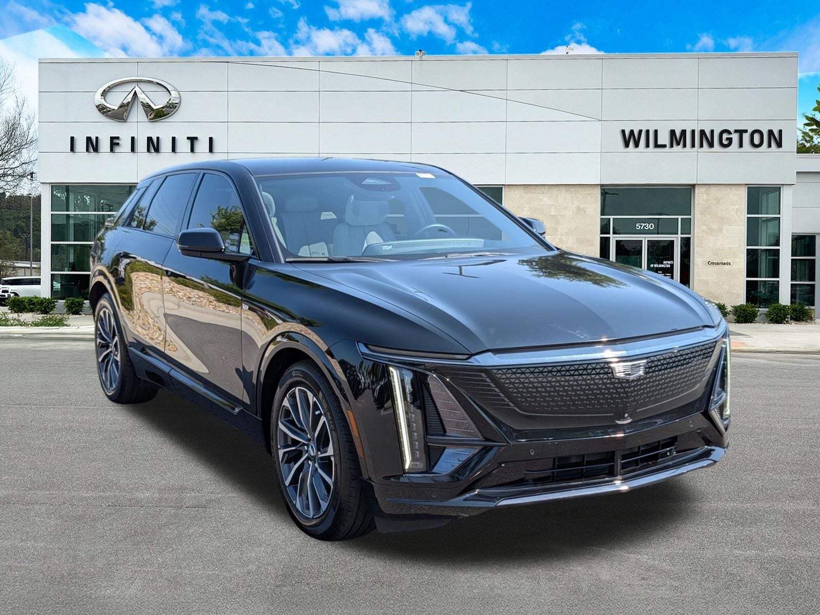2024 Cadillac LYRIQ Sport in Stellar Black Metallic — front three-quarter view