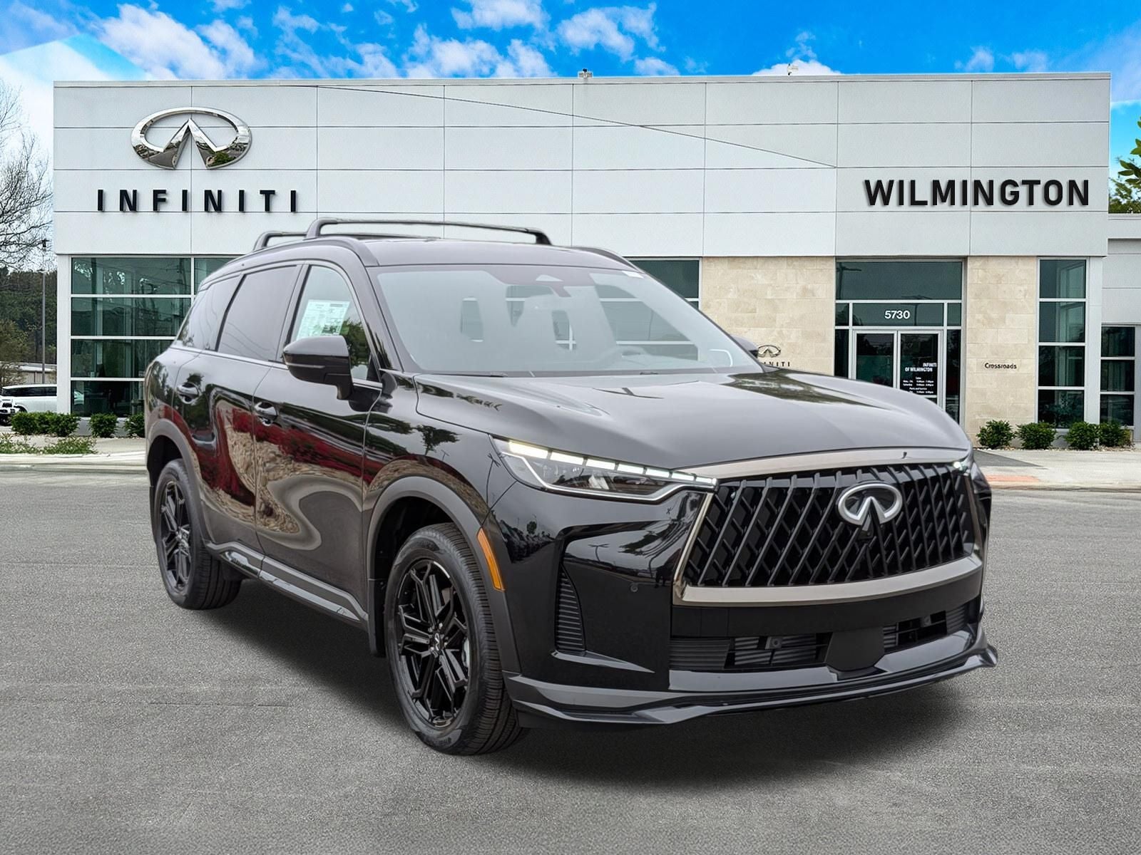 2027 INFINITI QX60 SPORT in Mineral Black — front three-quarter view
