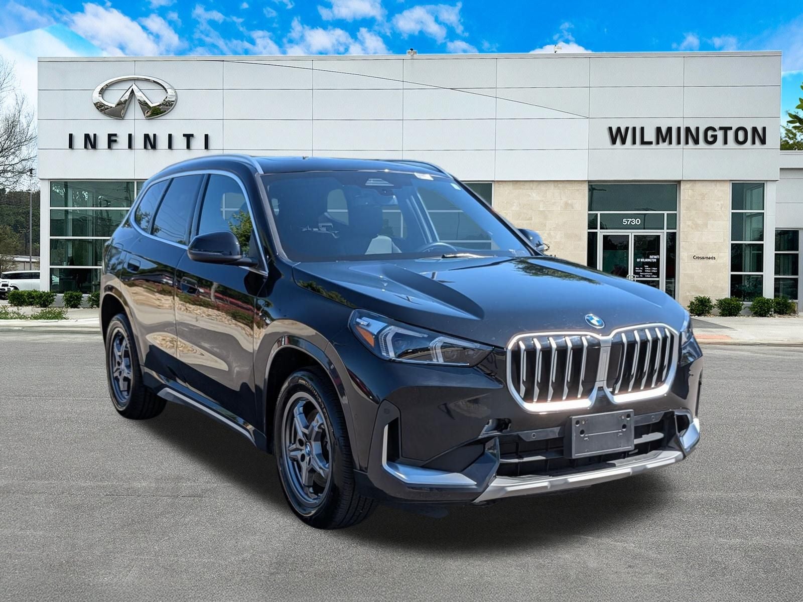 2025 BMW X1 xDrive28i in Jet Black — front three-quarter view