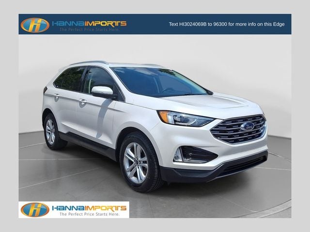 2019 Ford Edge SEL in White Platinum Clearcoat Metallic — front three-quarter view