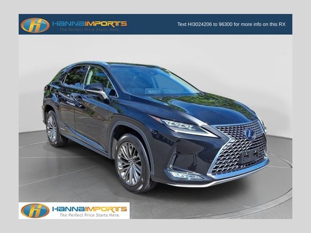 2022 Lexus RX 450h in Caviar — front three-quarter view