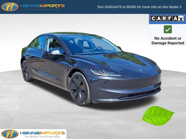 2024 Tesla Model 3 Base in Solid Black — front three-quarter view