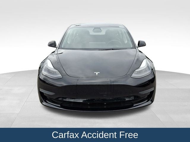 2023 Tesla Model 3 — side profile view