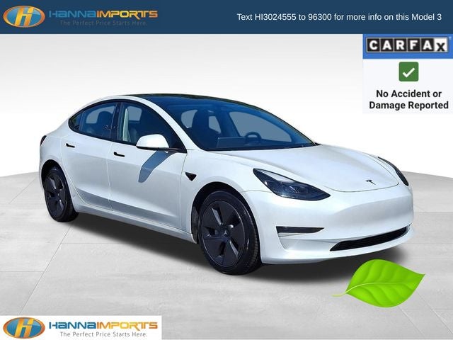 2023 Tesla Model 3 Base in White — front three-quarter view