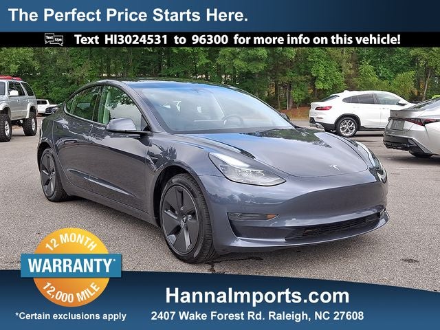 2023 Tesla Model 3 Base in Midnight Silver Metallic — front three-quarter view