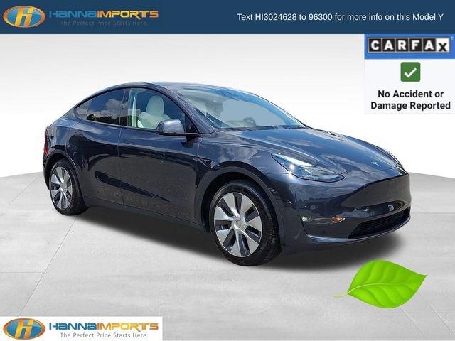 2024 Tesla Model Y Long Range in Gray — front three-quarter view