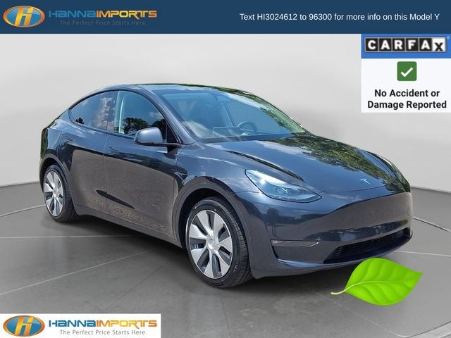 2024 Tesla Model Y Long Range in Gray — front three-quarter view