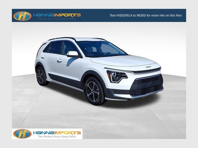 2023 Kia Niro EX in Snow White Pearl — front three-quarter view