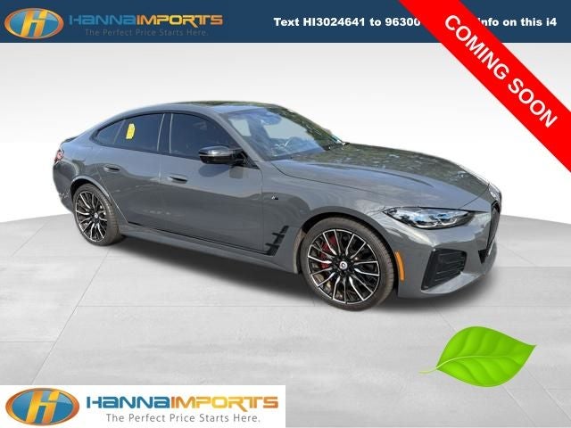 2024 BMW i4 M50 in Individual Dravit Gray Metallic — front three-quarter view