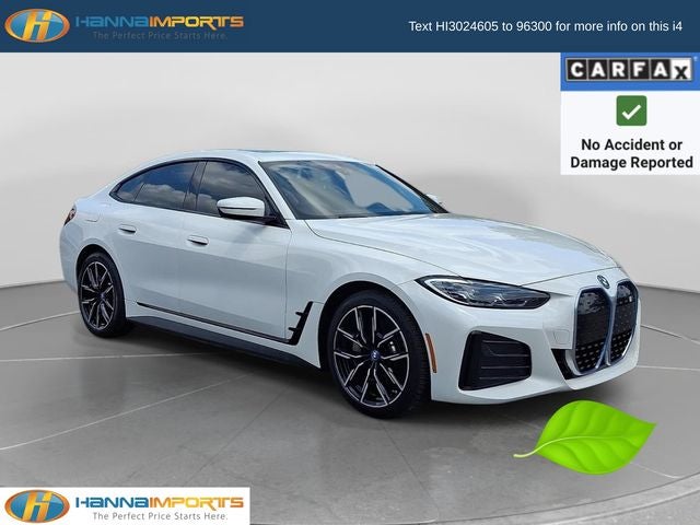 2023 BMW i4 eDrive40 in Alpine White — front three-quarter view