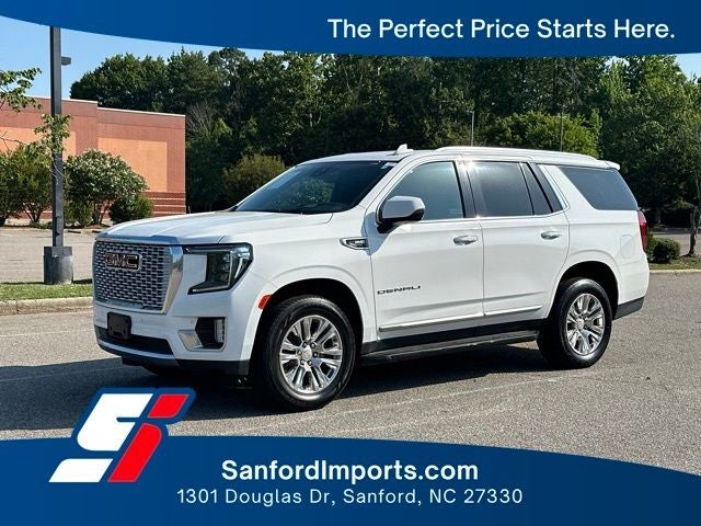 2023 GMC Yukon Denali in Summit White — front three-quarter view