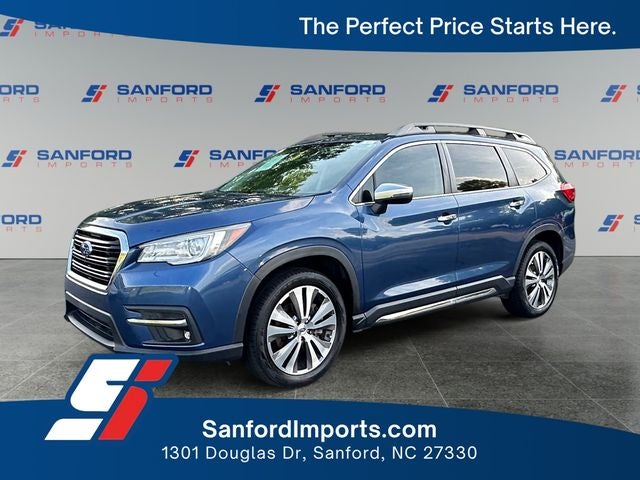 2022 Subaru Ascent Touring in Abyss Blue Pearl — front three-quarter view