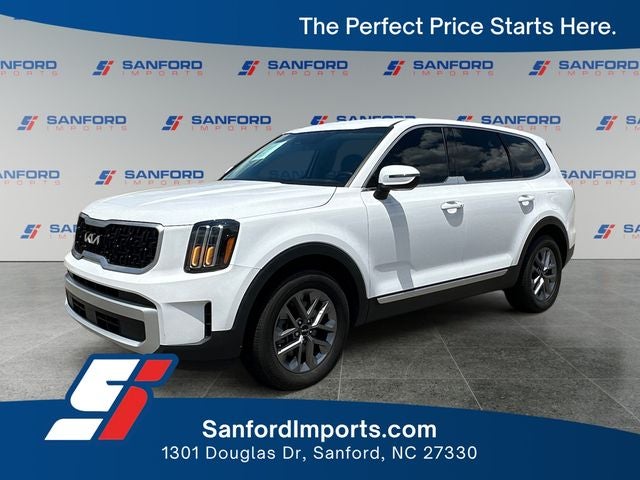 2024 Kia Telluride LX in Glacial White Pearl — front three-quarter view