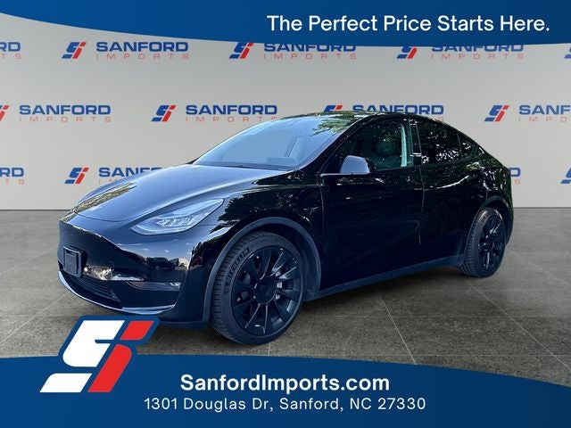 2021 Tesla Model Y Long Range in Black — front three-quarter view