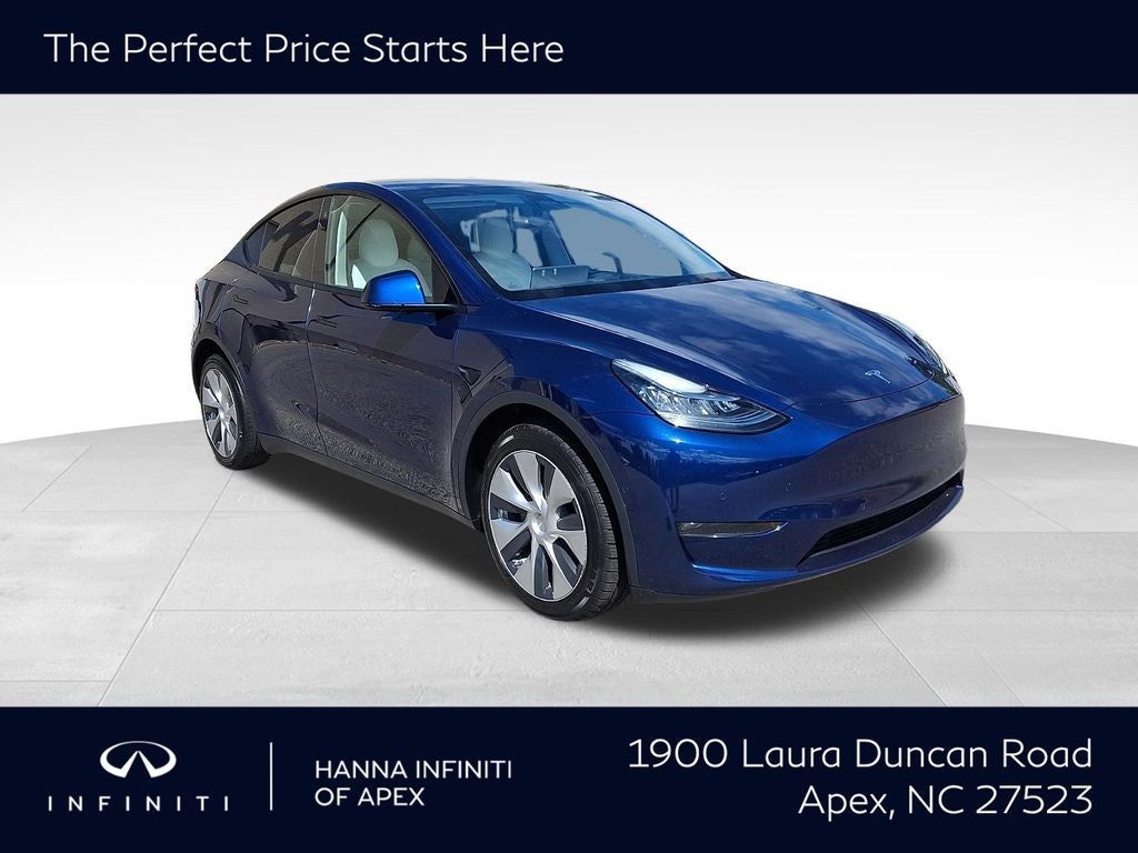 2022 Tesla Model Y Long Range in Deep Blue Metallic — front three-quarter view