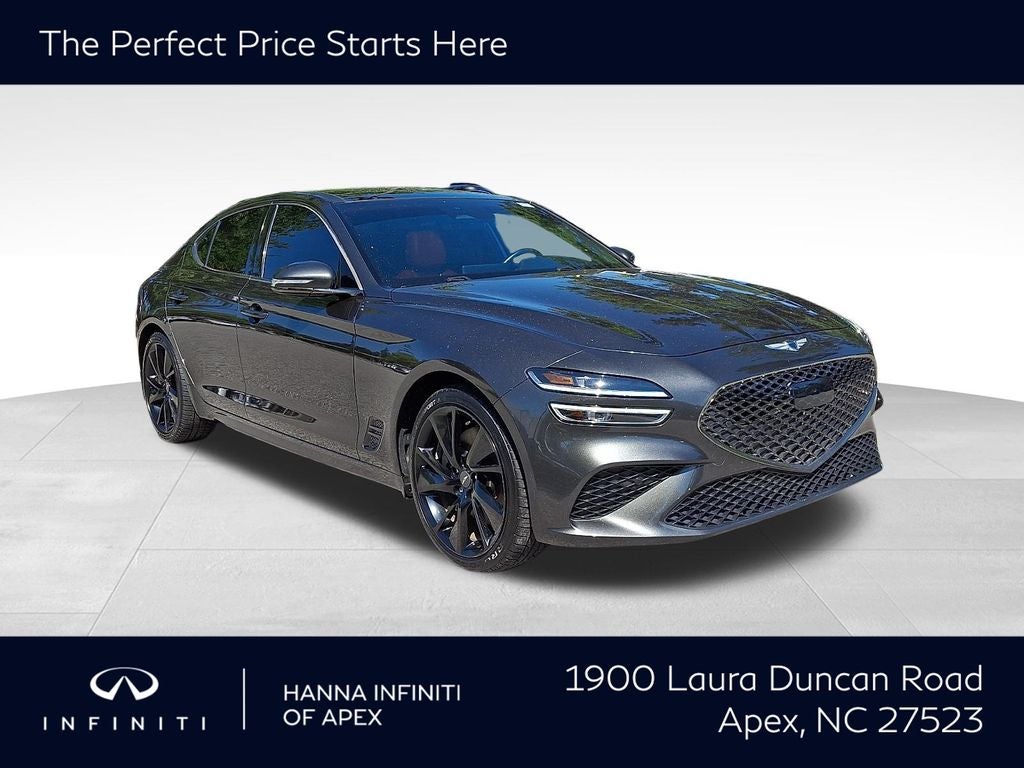 2023 Genesis G70 3.3T in Makalu Gray — front three-quarter view